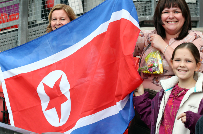 North Korean fans show their support during a soccer match between North Korea and the U.S. on Tuesday.(Yonhap News)