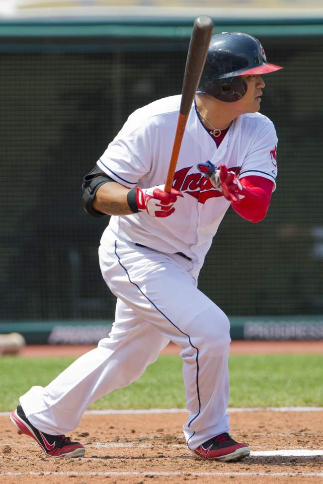 Indians right fielder Choo Shin-soo hits an RBI single in the second inning. (AFP-Yonhap News)
