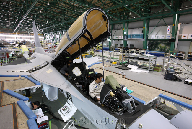 Employees work on a TA-50 trainer jet on the production line of the Korea Aerospace Industries Ltd. plant in Sacheon, South Gyeongsang Province. (Bloomberg)