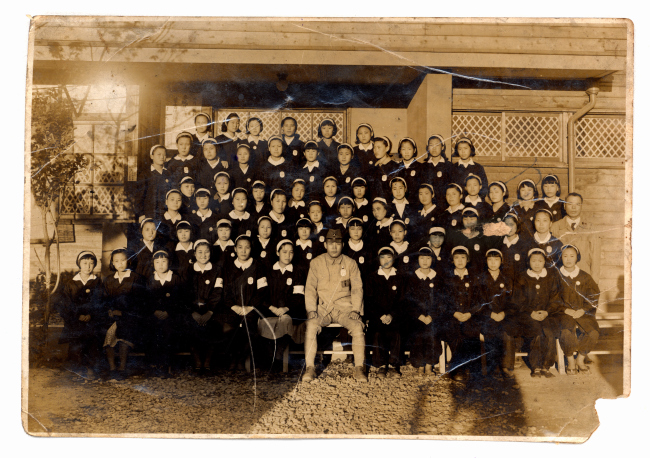 Young students at Suncheon Nam Elementary School who were tricked by their headmaster and teachers into forced labor in 1944. One of the students in the photo worked at an aircraft plant in Nagoya, Japan.