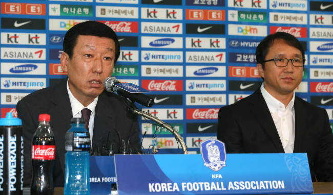 Head coach Choi Kang-hee (left) speaks during a press conference in Seoul on Wednesday. On the right is Hwangbo Kwan, head of the Korea Football Association’s technical committee. (Yonhap News)