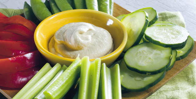 “Practically Raw” by Amber Shea Crawley features raw recipes for anyone, including this zucchini hummus. (Kansas City Star/MCT)