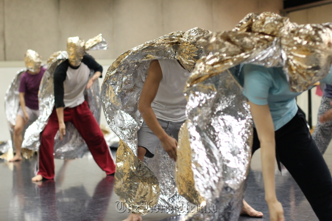 Dancers rehearse French choreographer Pierre Rigal’s upcoming show “Theatre of Operations.” ( LG Arts Center)