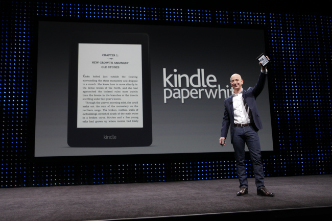 Amazon CEO Jeff Bezos introduces the Kindle Paperwhite tablet at a news conference on Thursday. (Bloomberg)