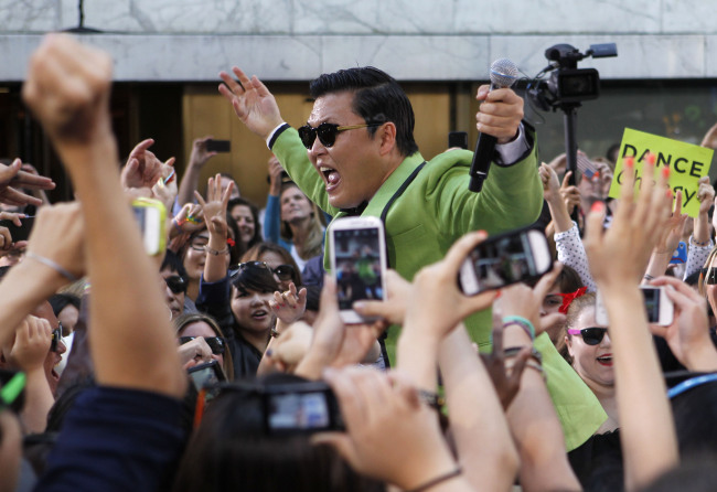 South Korean rapper Psy performs his massive K-pop hit 