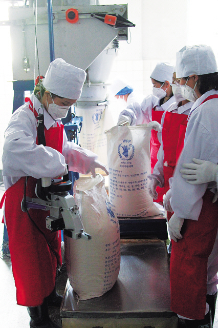 Workers package food aid at a World Food Programme-supported factory in Pyongyang, North Korea. (Irish Embassy)