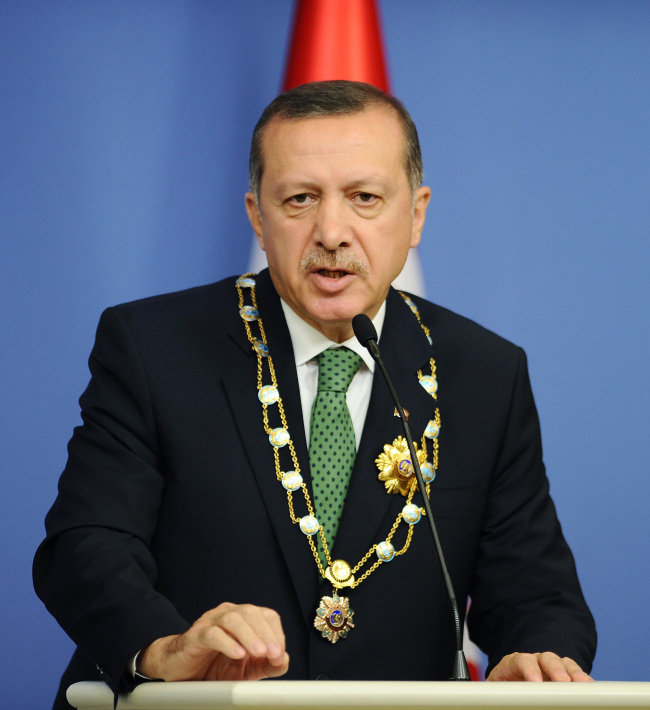 Turkey’s Prime Minister Recep Tayyip Erdogan speaks during a news conference in Ankara on Thursday. (AP-Yonhap News)