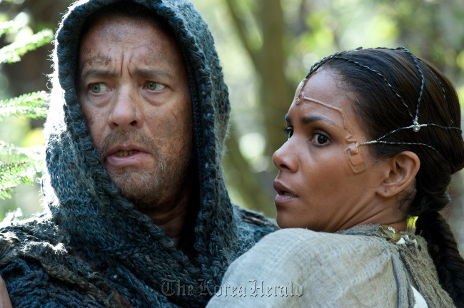 Tom Hanks stars as Zachry, and Halle Berry as Meronym, in the epic drama, “Cloud Atlas” distributed by Warner Bros. Pictures. (MCT)