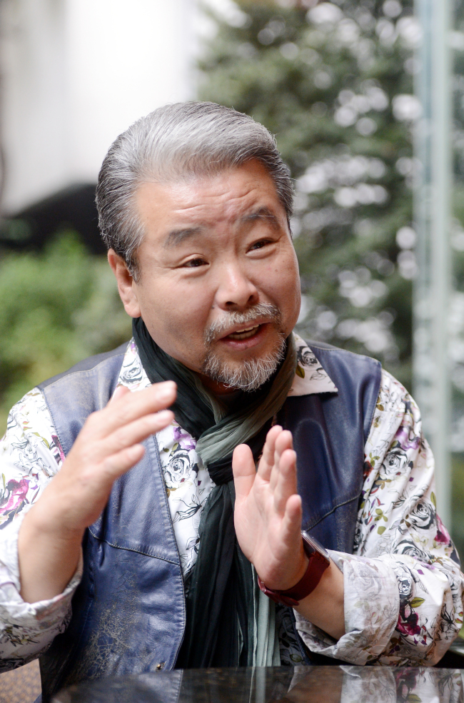 Samulnori Master Kim Duk-soo speaks during his interview with The Korea Herald on Tuesday at Lotte Hotel in downtown Seoul. ( Ahn Hoon/The Korea Herald)