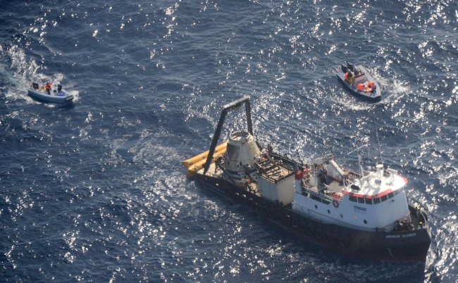 This photo provided by SpaceX shows an unmanned Dragon freighter that left the International Space Station with a stash of precious medical samples and aimed for a Pacific splashdown to end the first official shipment under a billion-dollar contract with NASA, Sunday. (AP)