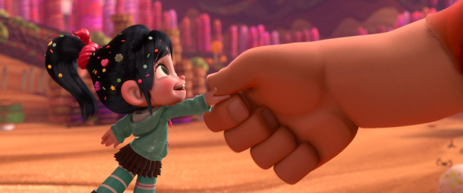 In “Wreck-It Ralph,” Vanellope Von Schweetz Chweetz (left) voiced by Sarah Silverman, and Ralph, voiced by John C. Reilly, in the video game world of Sugar Rush. (Disney/MCT)