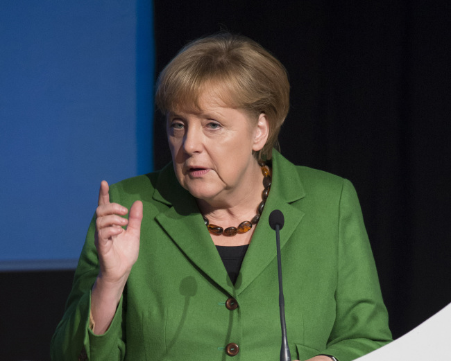 German Chancellor Angela Merkel delivers a speech in Timmendorfer Strand, Germany, Monday. (AP-Yonhap News)