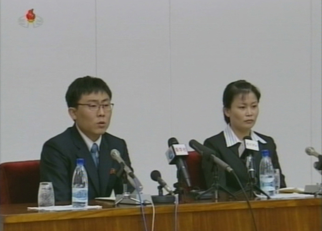 In this image captured from the (North) Korean Central News Agency, Kim Kwang-hyok (left) and Ko Jong-nam speak at a news conference on Nov. 8 in Pyongyang upon their return to the communist country after nearly four years in the South. (Yonhap News)