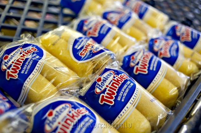 Hostess Brands Inc. Twinkies snacks sit on a shelf inside the company’s outlet store in Peoria, Illinois. (Bloomberg)