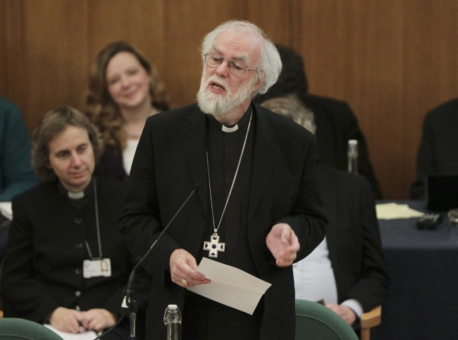 Rowan Williams, the outgoing Archbishop of Canterbury, speaks during a meeting of the General Synod of the Church of England in London on Tuesday. (AP-Yonhap News)