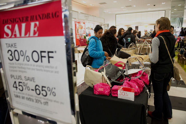 Shoppers browse handbags on sale at a Bloomingdale’s store in the Westfield San Francisco Center in San Francisco, California, Friday. (Bloomberg)