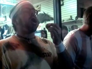 This frame grab made from video on Friday and provided by John-Patrick McNown shows Edward Archbold competing in a roach-eating contest at Ben Siegel Reptile Store in Deerfield Beach, Florida. (AP)