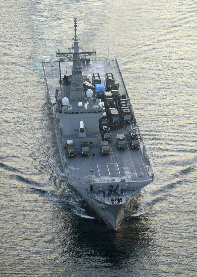 Japan’s Maritime Self-Defense Force transport ship Kunisaki, carrying ground-based Patriot Advanced Capability-3 interceptors, leave the MSDF base in Kure, Hiroshima Prefecture, western Japan. The Kunisaki and another MSDF transport ship, the Osumi, carry the missile interceptors to be deployed in Okinawa to prepare for North Korea’s planned rocket launch. (AP-Yonhap News)