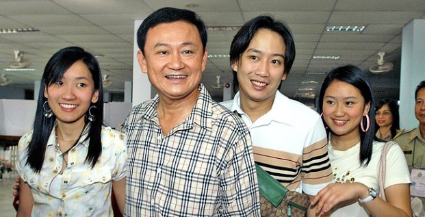 Paetongtarn Shinawatra, right, with her father Thaksin and siblings back in 2005. (AP)