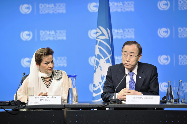 United Nations Secretary-General Ban Ki-moon (right) and Christiana Figueres, Executive Secretary of the United Nations Framework Convention on Climate Change, attend a joint press briefing at the Qatar National Convention Center in Doha on Friday. (Xinhua-Yonhap News)