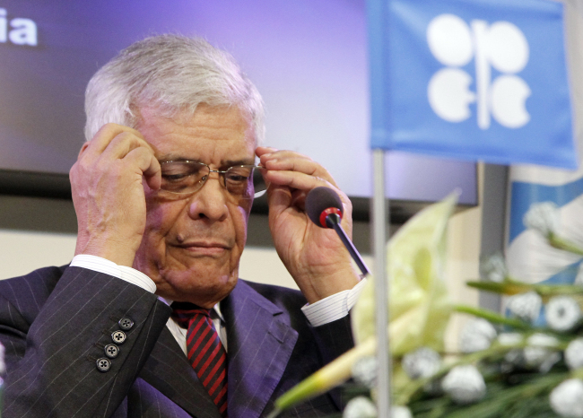 Secretary General of OPEC Abdalla Salem El-Badri of Libya adjusts his glasses during a news conference after a meeting of the Organization of the Petroleum Exporting Countries in Vienna on Wednesday. (AP-Yonhap News)