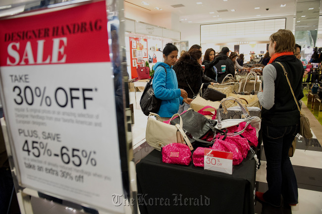 Shoppers browse handbags on sale at a Bloomingdale’s store in the Westfield San Francisco Centre in San Francisco, California. (Bloomberg)