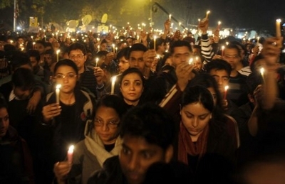 Indian protesters hold candles during a rally in New Delhi late December 29, 2012. (AFP)