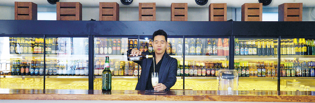 Beerlogy stocks 62 kinds of bottled beer, including India pale ales, cider and hard-to-find craft beer. (Lee Sang-sub/The Korea Herald)