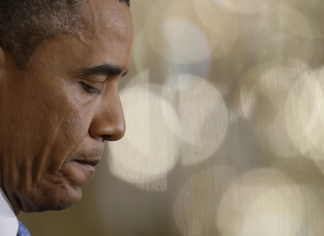 U.S. President Barack Obama pauses before answering a question from members of the media during a press conference in the East Room of the White House in Washington on Monday. ( AP-Yonhap News)