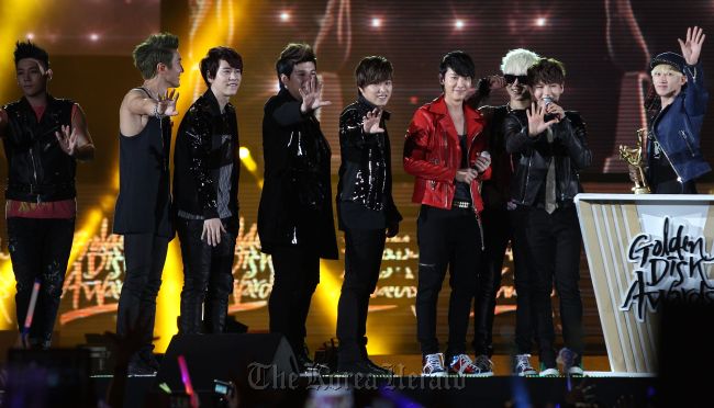 K-Pop group Super Junior receive their awards on stage during the Samsung Galaxy 27th Golden Disk Awards at the Sepang International Circuit in Sepang, outside Kuala Lumpur on Tuesday. (AFP-Yonhap News)