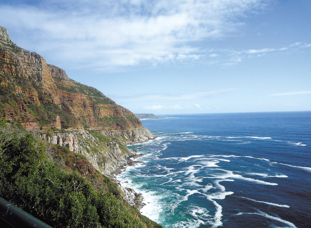 One of the world’s most famous coastal routes, Chapman’s Peak Drive winds south from Cape Town, South Africa. (Los Angeles Times/MCT)