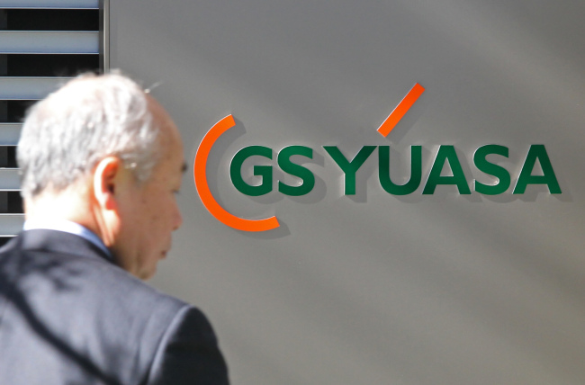 GS Yuasa Corp.’s logo is displayed outside the company’s office in Tokyo on Friday. (Bloomberg)