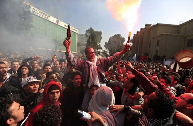 Supporters of Cairo`s Al-Ahly celebrates after the verdict. (AP)