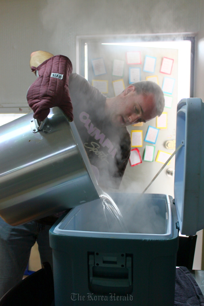 Matt Curtis combines the water and grain in a beermaking process called mashing. Altogether, brewing takes about four weeks.