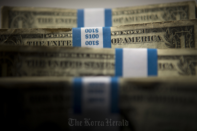 Stacks of U.S. $1 bills. (Bloomberg)