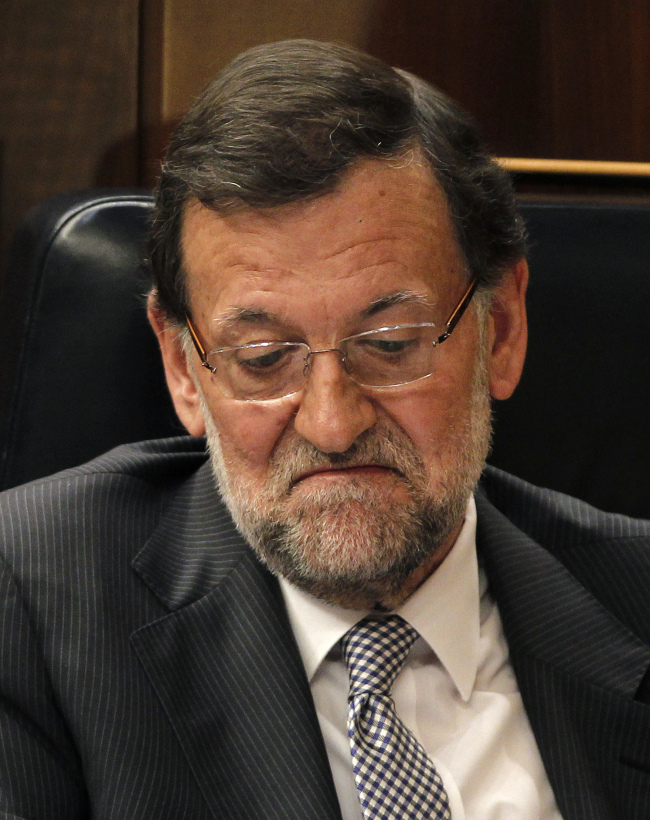 Spain’s Prime Minister Mariano Rajoy reacts during a debate at the Spanish Parliament in Madrid on Wednesday. (AP-Yonhap News)