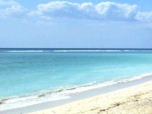 A beach in western Mauritius is pictured on October 4, 2002. Scientists said Sunday they had found traces of a micro-continent hidden underneath the Indian Ocean island of Mauritius. (AFP)