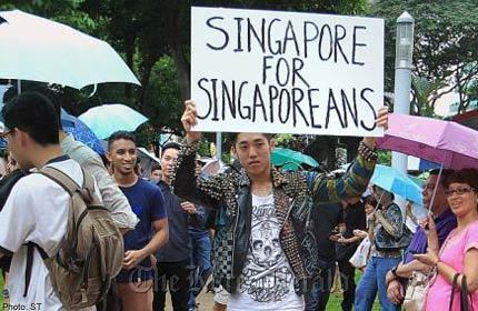 A young man, who goes by the online name Daryl Nihility, attended the protest in Hong Lim Park last Saturday in punk attire and held up a sign saying “Singapore for Singaporeans.” He has denied being xenophobic. (The Straits Times)