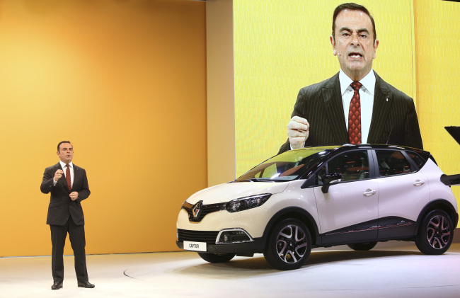 Renault CEO Carlos Ghosn speaks at the 83rd Geneva International Motor Show on Tuesday. (Bloomberg)