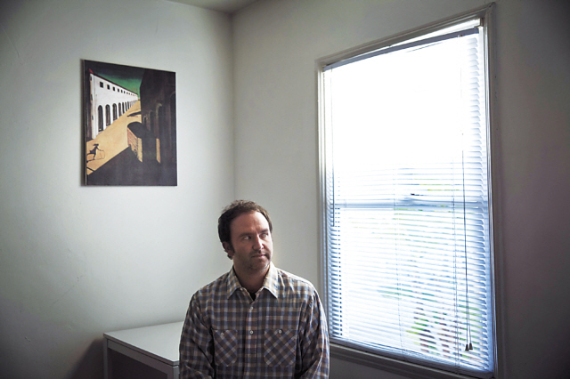 Fiction writer Jim Gavin, shown at home in Culver City, California, on Feb. 4, is author of “Middle Men.” (Los Angeles Times/MCT)