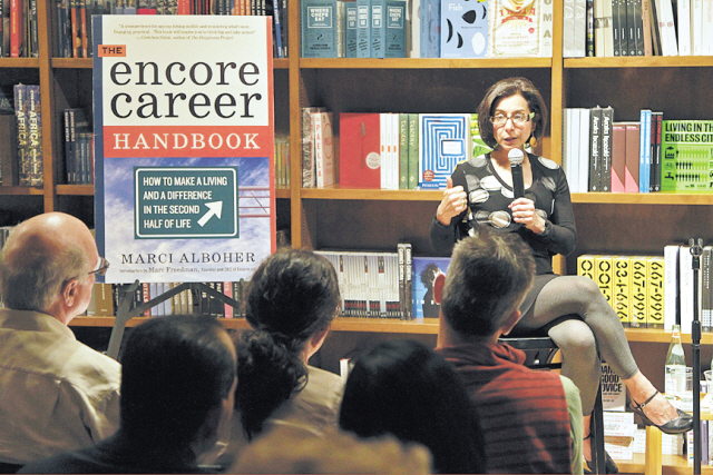 Author Marci Alboher, center, talks about her book “Encore Career” at Books & Books on Jan. 22, 2012, in Coral Gables, Florida. (Miami Herald/MCT)