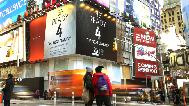 Signboards at Times Square in New York advertise Samsung’s upcoming release of its Galaxy S4 smartphone. (Samsung Electronics)
