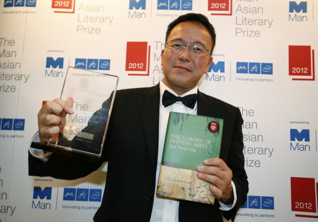 Malaysian author Tan Twan Eng poses after his novel “The Garden of Evening Mists” won the 2012 Man Asian Literary Prize in Hong Kong Thursday. (AP-Yonhap News)