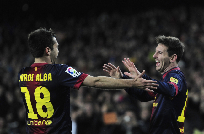 FC Barcelona’s Lionel Messi (right) celebrates with teammate Jordi Alba after his goal on Sunday. (AP-Yonhap News)