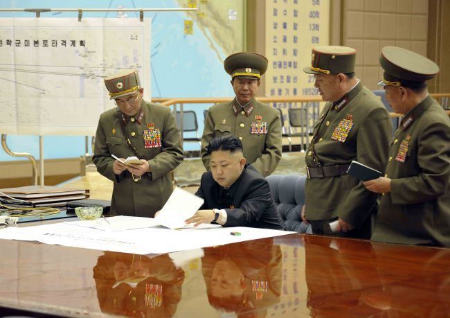 North Korean leader Kim Jong-un is seen at an urgent operation meeting on the Korean People’s Army’s Strategic Rocket Force’s performance of duty in a photo released by the North’s Korean Central News Agency. (Yonhap News)