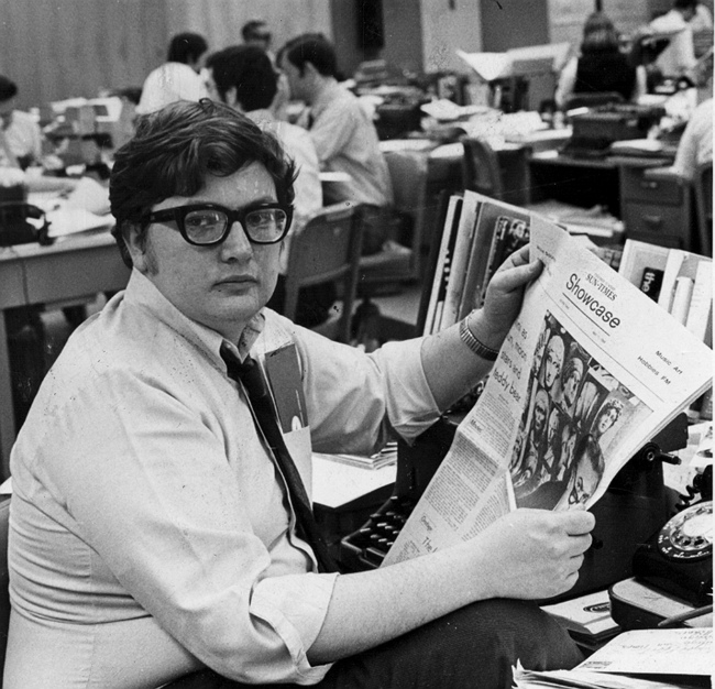 This 1969 photo shows Chicago Sun-Times movie critic Roger Ebert in the newsroom of the paper in Chicago. (AP-Yonhap News)