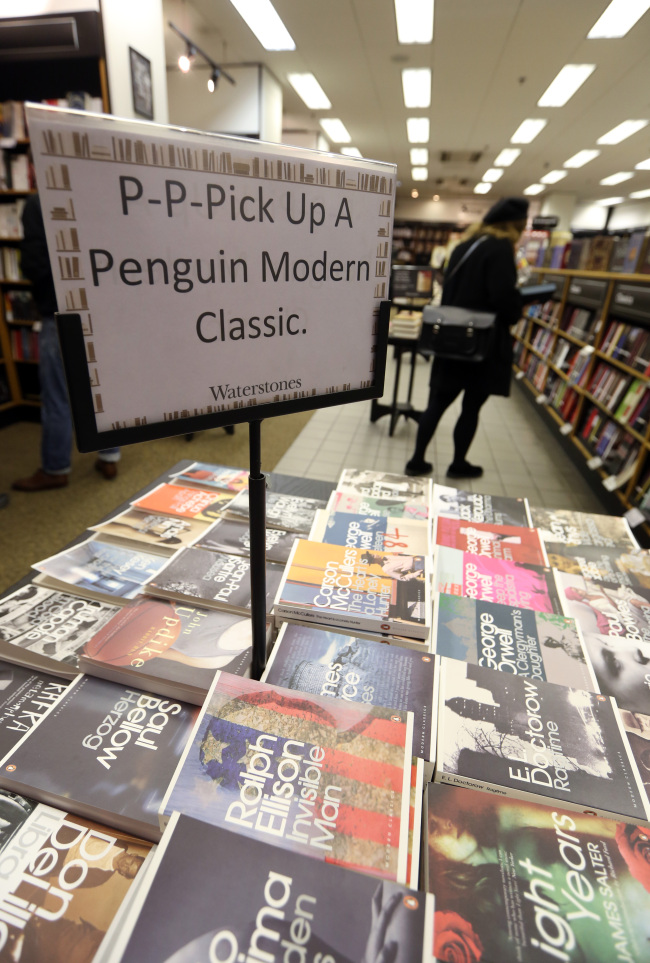 A display of books published by the Penguin publishing house, part of Pearson Plc, is seen at a bookstore in London on Friday. (Bloomberg)