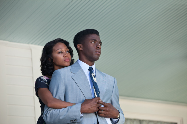 Nicole Beharie (left) as Rachel Robinson and Chadwick Boseman (right) as Jackie Robinson are seen in “42.” (Warner Bros/MCT)