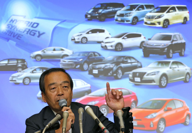 Takeshi Uchiyamada, vice chairman of Toyota Motor Corp., speaks during a press conference at its headquarters in Tokyo on Wednesday. (AP-Yonhap News)