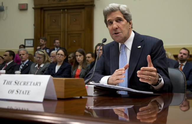 U.S. Secretary of State John Kerry testifies on Capitol Hill in Washington on Wednesday before the House Foreign Affairs Committee hearing on the State Department’s fiscal 2014 foreign affairs budget. (AP-Yonhap News)